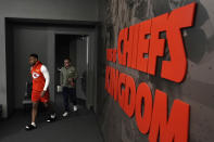 Kansas City Chiefs wide receiver JuJu Smith-Schuster enters an interview room to talk to reporters before an NFL football workout Wednesday, Jan. 25, 2023, in Kansas City, Mo. The Chiefs are scheduled to play the Cincinnati Bengals Sunday in the AFC championship game. (AP Photo/Charlie Riedel)