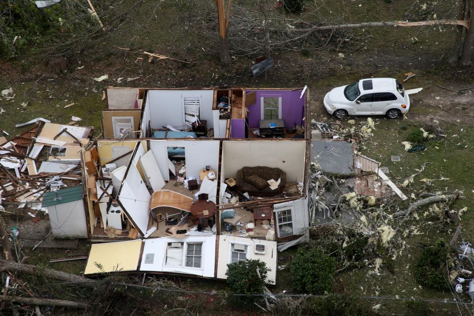 Seen from the air, parts of Cairo, Ga. are heavily damaged Monday, March 4, 2019 after a tornado ripped through the town Sunday night.