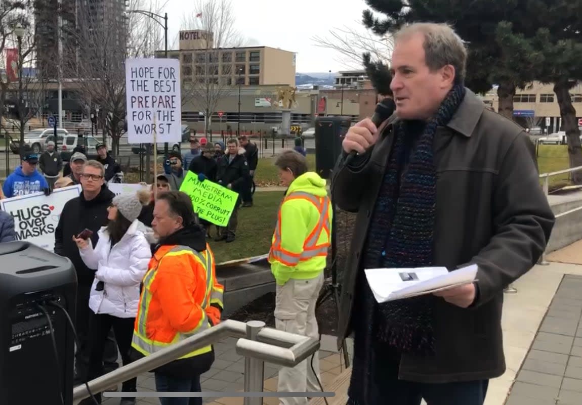 David Lindsay, shown here at an Okanagan Freedom Rally,  has had his sentencing on two criminal counts of assault delayed because of a hospital admission. (Chris Walker/CBC - image credit)