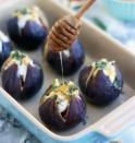 <p>These simple figs are the perfect mix of sweet and savory. If fresh figs aren't in season, you can used dried figs, or substitute fresh plums. Get the recipe <a rel="nofollow noopener" href="https://happykitchen.rocks/baked-figs-goat-cheese?mbid=synd_yahoofood" target="_blank" data-ylk="slk:here" class="link ">here</a>.</p>