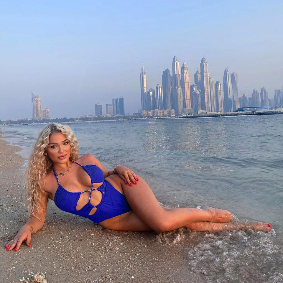 Emmy Russ, 22, posing on the beach in Dubai. Source: Newsflash/Australscope