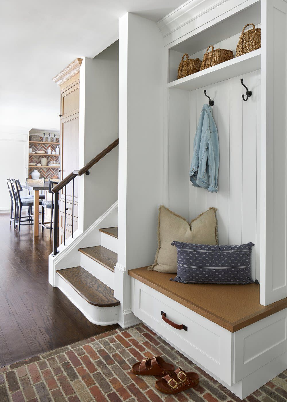 built in hallway tree under stairs