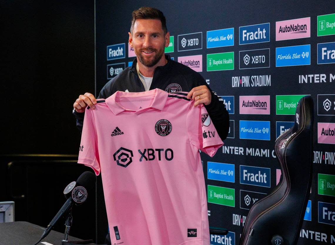 Inter Miami forward Lionel Messi poses with his jersey during a press conference at DRV PNK Stadium on Thursday, Aug. 17, 2023, in Fort Lauderdale, Fla. 