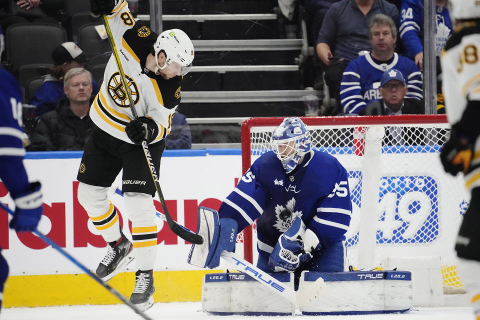 Toronto Maple Leafs' goaltender Ilya Samsonov (35) makes a save as Boston Bruins' Pavel Zacha (18) tries for a tip during the second period of an NHL hockey game, Wednesday, Feb.1, 2023 in Toronto. (Frank Gunn/The Canadian Press via AP)