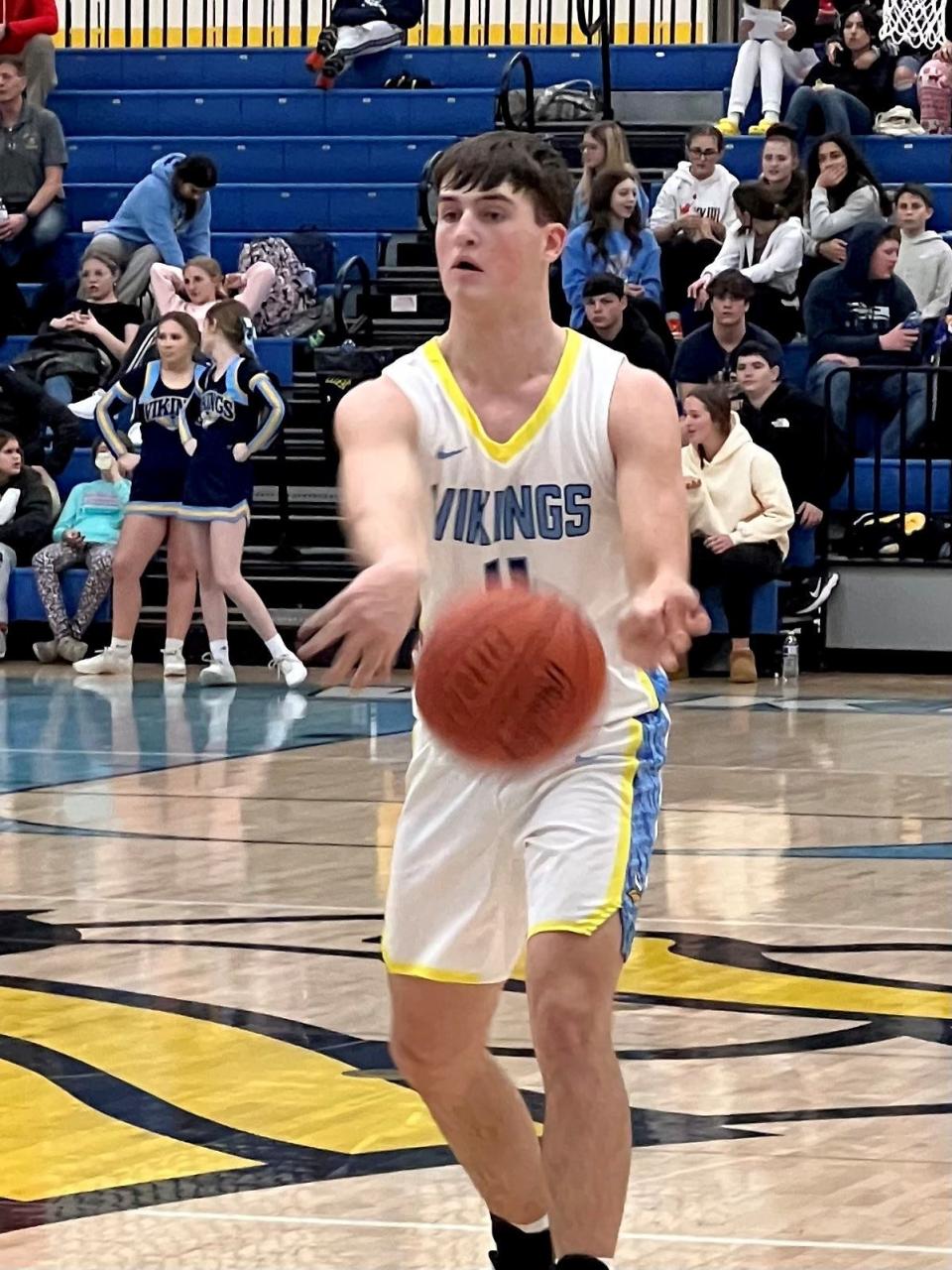 River Valley's Chase Ebert throws a pass to the corner against Highland Thursday night in a home boys basketball game in the Mid Ohio Athletic Conference.