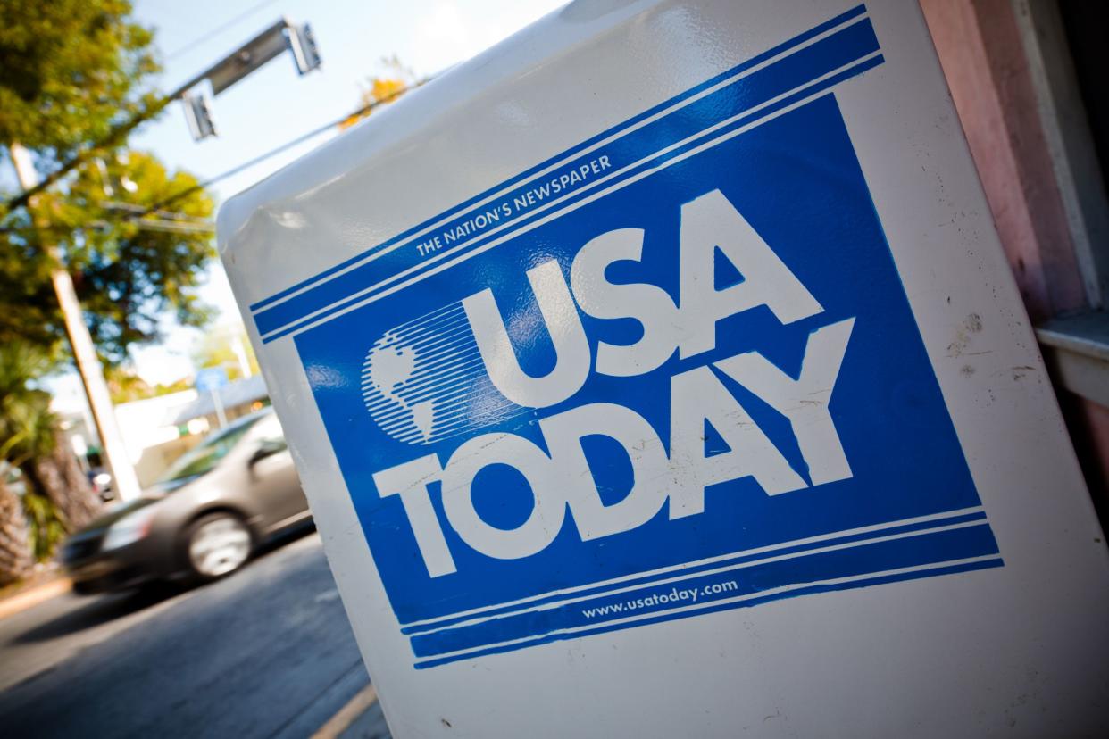 Key West, Florida, USA - March 20, 2011: close-up of a USA Today sign located on a  news stand in a street of Key West.