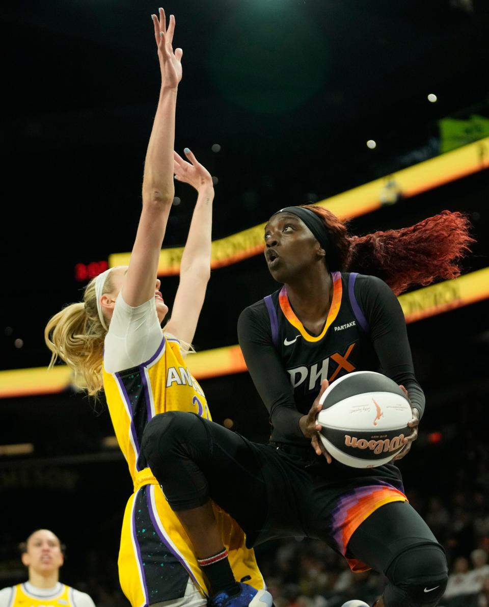 Phoenix Mercury guard Kahleah Copper (2) looks to shoot around Los Angeles Sparks forward Cameron Brink (22) during the first quarter on Sunday, June 2, 2024, at Footprint Center in Phoenix.