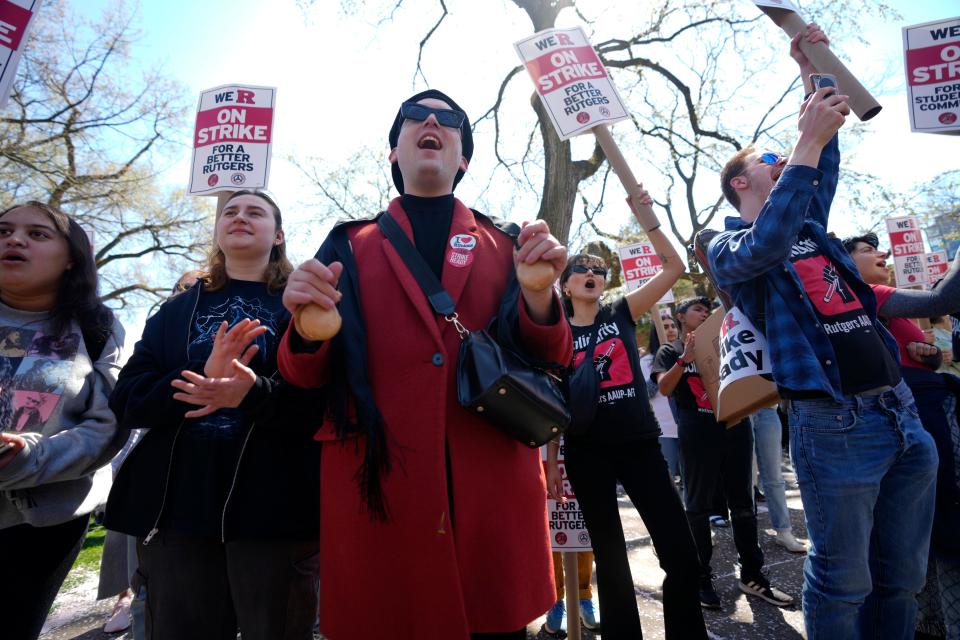 Teacher's Assistant Fran Cantero (center), of Highland Park, was among the hundreds who rallied for a new contract at Rutgers University, in New Brunswick, Monday, April 10, 2023.