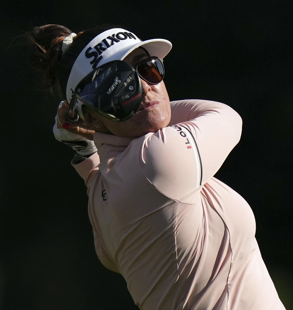 Hannah Green, of Australia, watches her tee shot on the 10th hole during the third round of the CPKC Women’s Open golf tournament Saturday, Aug. 26, 2023, in Vancouver, British Columbia. (Darryl Dyck/The Canadian Press via AP)