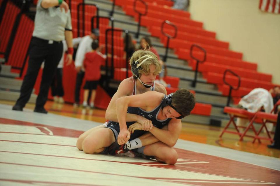 Bellefonte’s Wyatt Long controls Penns Valley’s Conner Myers in their 107-pound bout of the Red Raiders’ 51-9 loss on Wednesday at Bellefonte. Long beat Myers, 6-3. Jennie Tate/For the CDT