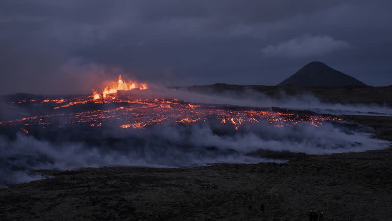 Lava emerges from a fissure of the Fagradalsfjall volcano near the Litli-Hrútur mountain, some 19 miles southwest of Reykjavik, Iceland, on Monday, July 10, 2023. Authorities in Iceland on Tuesday warned spectators to stay away from a newly erupting volcano that is spewing lava and noxious gases from a fissure in the country’s southwest.