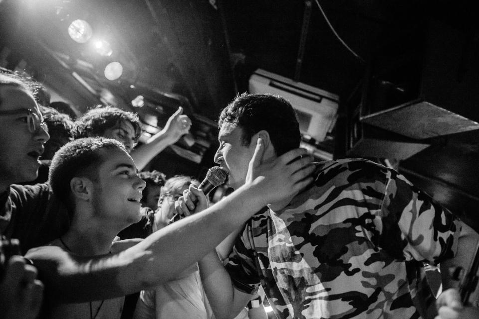 A photo of British post-punk band Shame performing at the 100 Club, featured in a book about the venue's history: Phoebe Fox