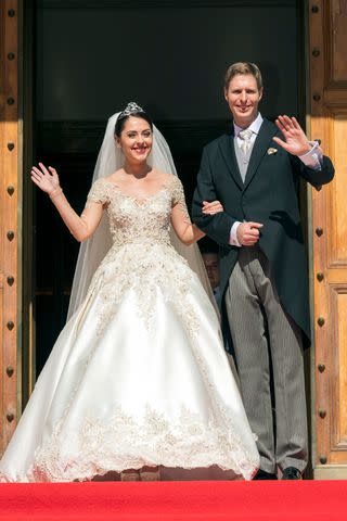 <p>Luc Castel/Getty</p> Crown Prince Leka of Albania and Elia Zaharia on their October 2016 wedding day.