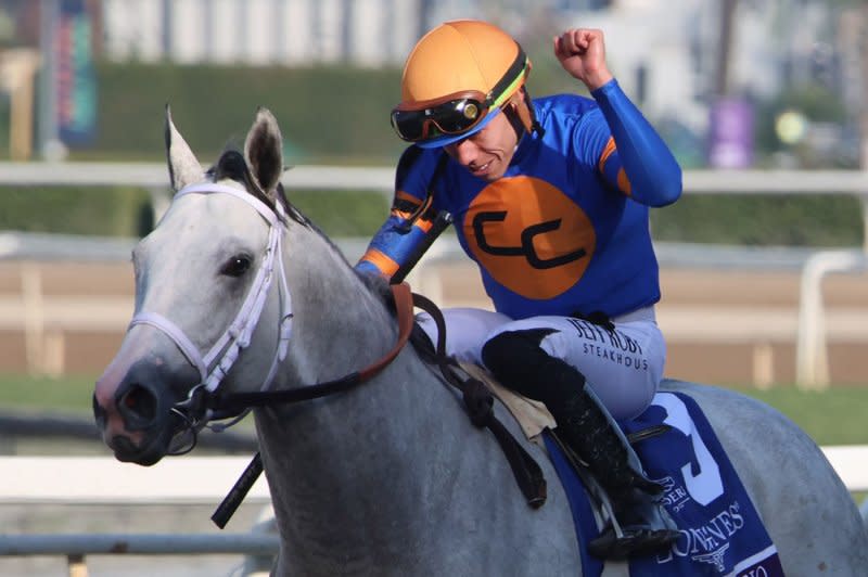 Irad Ortiz Jr., aboard White Abarrio, heads for the winner's circle after capturing the Breeders' Cup Classic during the 40th running of the Breeders' Cup Championships at Santa Anita Park in Arcadia, Calif., on Saturday. Photo by Mark Abraham/UPI