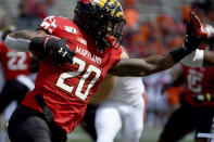 FILE - In this Sept. 7, 2019, file photo, Maryland running back Javon Leake (20) runs against Syracuse during the first half of an NCAA college football game, in College Park, Md. Leake was selected to The Associated Press All-Big Ten Conference team, Wednesday, Dec. 11, 2019. (AP Photo/Will Newton, File)