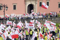 Polish farmers and other protesters gather in downtown Warsaw to protest the European Union's climate policies and Poland's pro-EU government, in Warsaw, Poland, Friday, May 10, 2024. (AP Photo/Czarek Sokolowski)