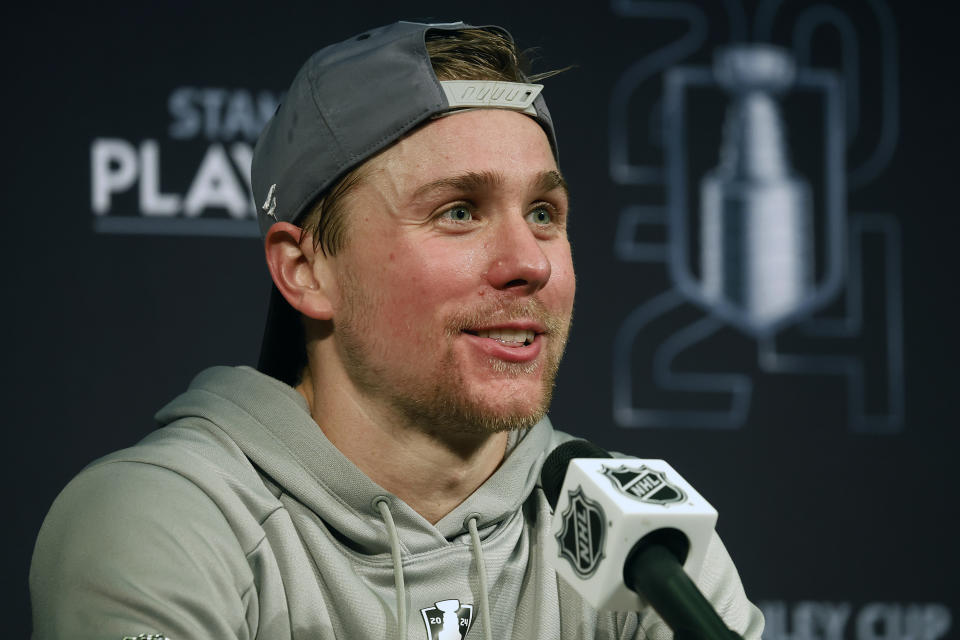 Carolina Hurricanes' Jack Drury (18) speaks at a news conference following the Hurricanes win at the NHL hockey Stanley Cup first-round playoff series in Raleigh, N.C., Tuesday, April 30, 2024. (AP Photo/Karl B DeBlaker)