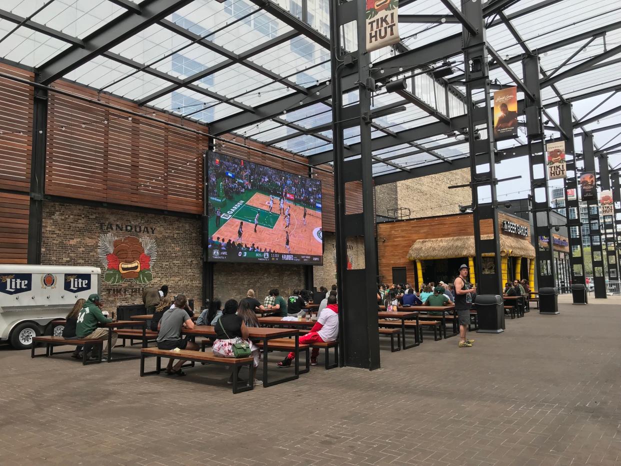 A handful of people watched the Milwaukee Bucks game from The Beer Garden in the Deer District. The area was packed with people during previous playoff games.