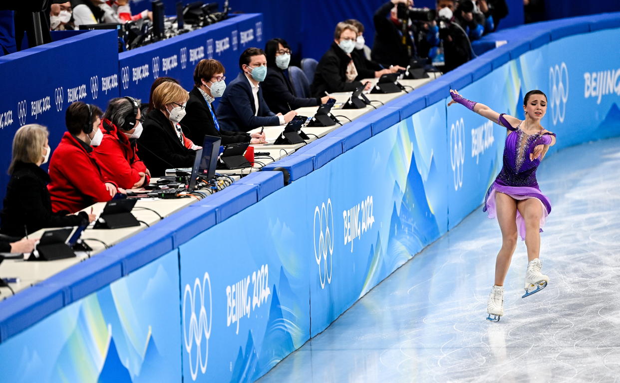 Beijing , China - 15 February 2022; Judges watch on as Kamila Valieva of ROC skates during the Women Single Skating Short Program event on day 11 of the Beijing 2022 Winter Olympic Games at Capital Indoor Stadium in Beijing, China. (Photo By Ramsey Cardy/Sportsfile via Getty Images)