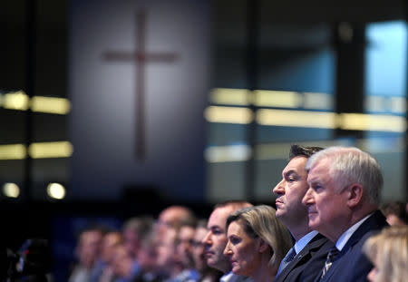 Horst Seehofer, outgoing leader of the Christian Social Union (CSU), Bavarian State Prime Minister Markus Soeder, member of the European Parliament Angelika Niebler and top candidate of the European People's Party (EPP) for the European elections, Manfred Weber, attend the CSU party meeting in Munich, Germany, January 19, 2019. REUTERS/Andreas Gebert