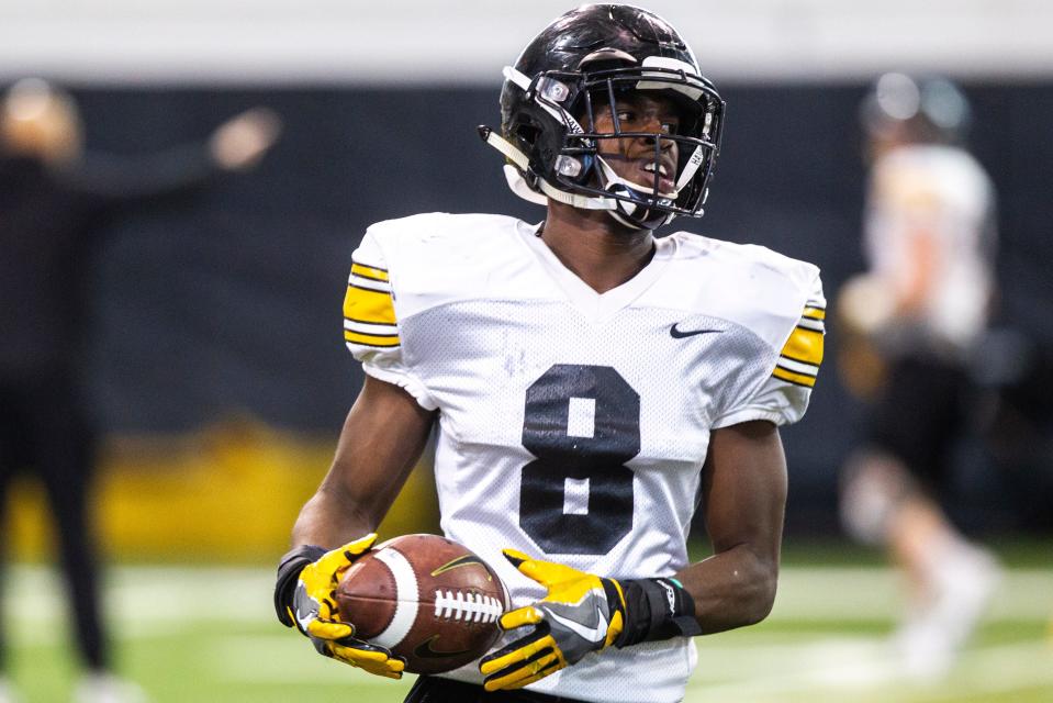 Iowa defensive back Matt Hankins (8) runs a drill during a NCAA football practice on Monday, Dec. 17, 2018, at the Hansen Football Performance Center in Iowa City.