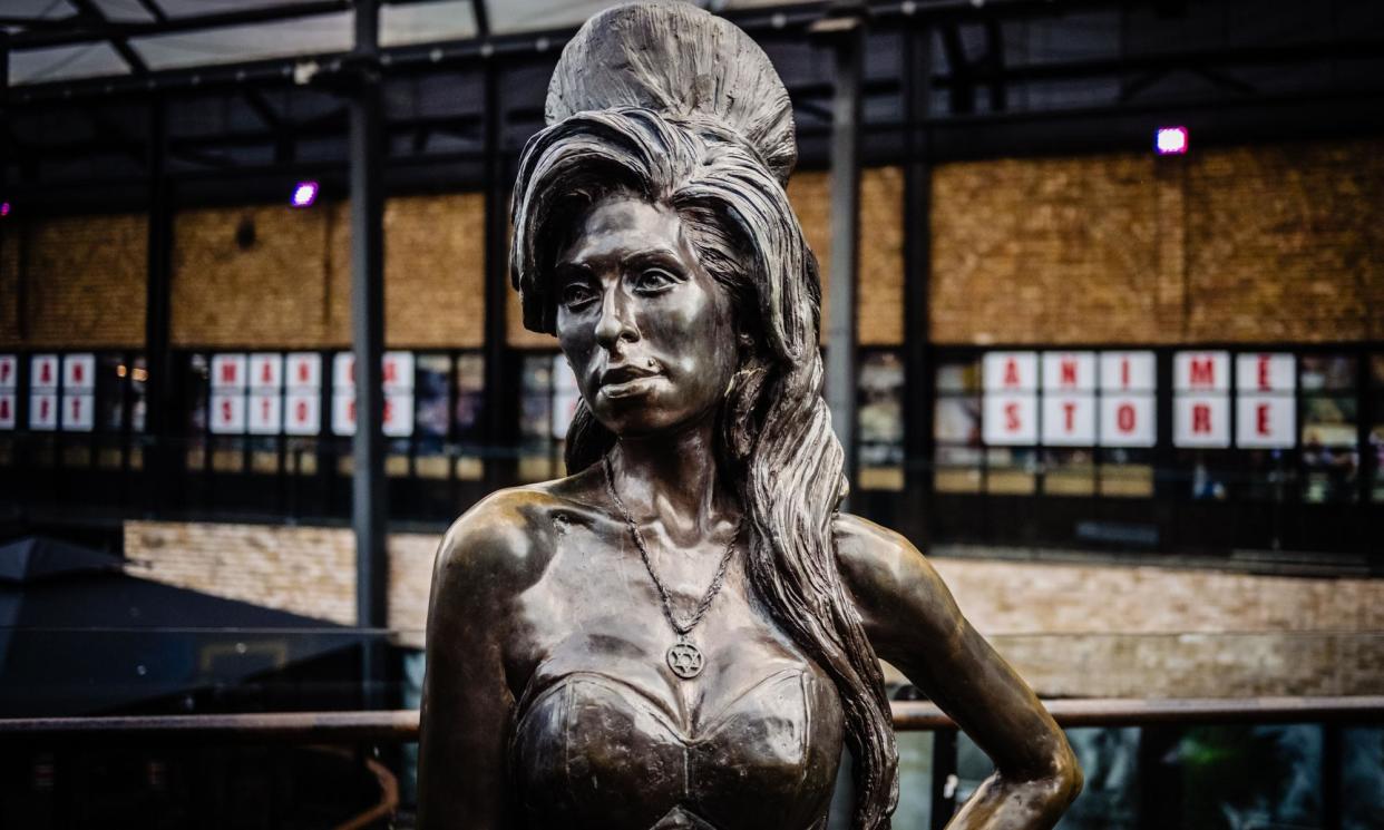 <span>Amy Winehouse statue in Camden Market, London.</span><span>Photograph: REX/Shutterstock</span>