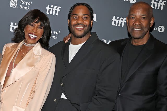 <p>Mat Hayward/Getty </p> Pauletta Washington, Malcolm Washington and Denzel Washington on Sept. 10, 2024