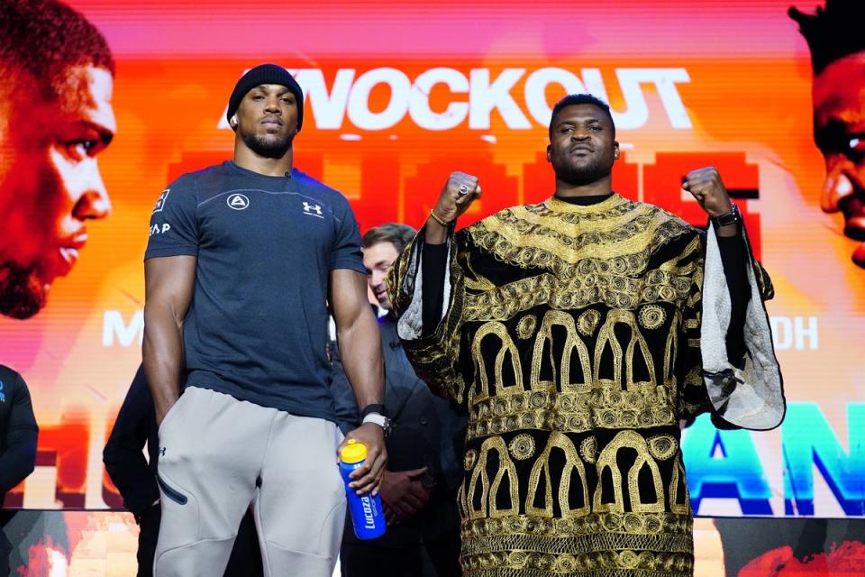 Joshua and Ngannou at the press conference for their upcoming fight (PA)