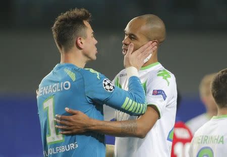 Football Soccer - CSKA Moscow v VfL Wolfsburg - Champions League Group Stage - Group B - Arena Khimki, Khimki, Russia - 25/11/15 VfL Wolfsburg's goalkeeper Diego Benaglio and his team mate Naldo celebrates after the match against CSKA Moscow REUTERS/Maxim Shemetov