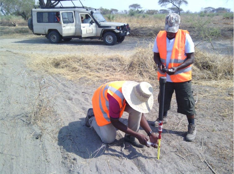 <span class="caption">Soil sampling for helium and capturing natural helium seeps in Tanzania.</span> <span class="attribution"><span class="source">Pete Barry</span>, <span class="license">Author provided</span></span>