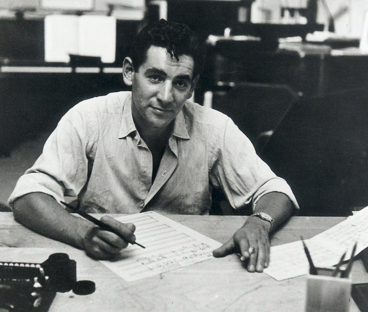 Leonard Bernstein works in his New York apartment in a 1947 file photo. The dynamic Bernstein was a guest conductor in Cincinnati several times in the 1940s and again in 1973.