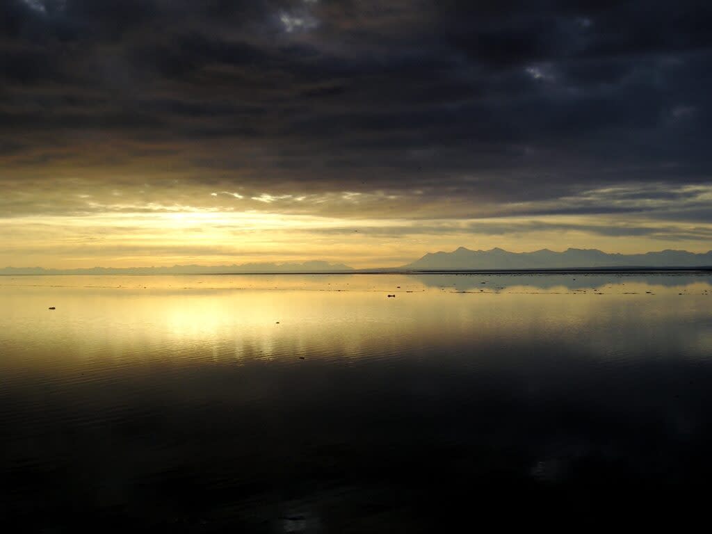A Cook Inlet sunset is seen in Anchorage on Oct. 29, 2010. (Photo by Terry McTigue/National Oceanic and Atmospheric Administration)