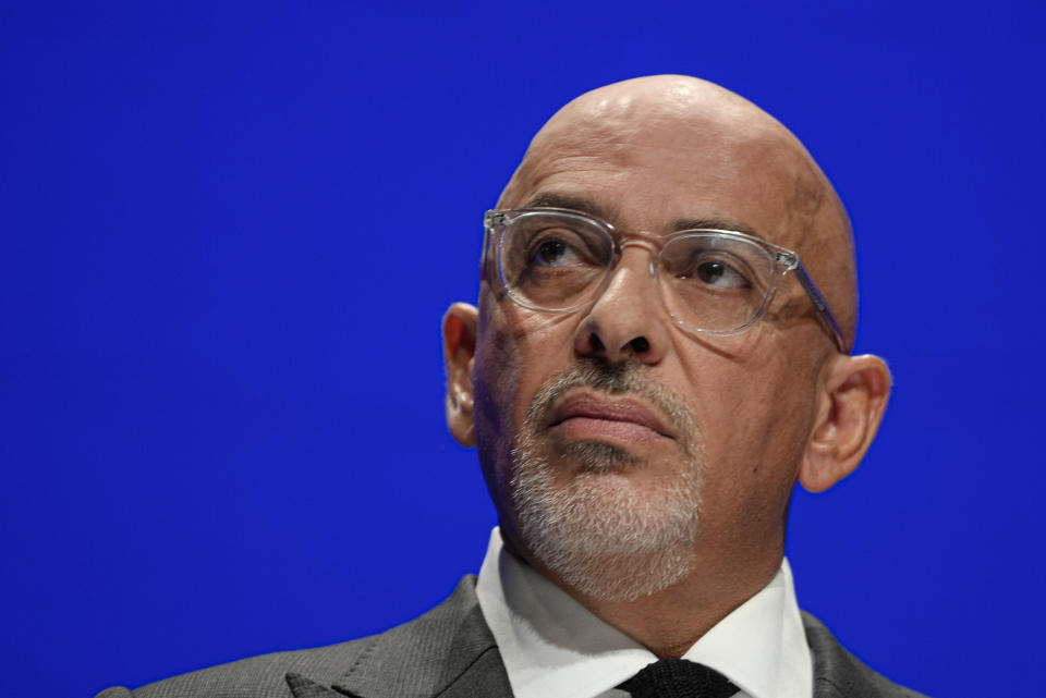 FILE - Chancellor of the Duchy of Lancaster, Nadhim Zahawi makes a speech at the Conservative Party conference at the ICC in Birmingham, England, Wednesday, Oct. 5, 2022. British Prime Minister Rishi Sunak has fired the chairman of his ruling Conservative Party chairman over a “serious breach” of the ministerial code. Pressure had been building on Nadhim Zahawi amid allegations he settled a multimillion-dollar unpaid tax bill while he was in charge of the country’s Treasury. (AP Photo/Kirsty Wigglesworth, File)