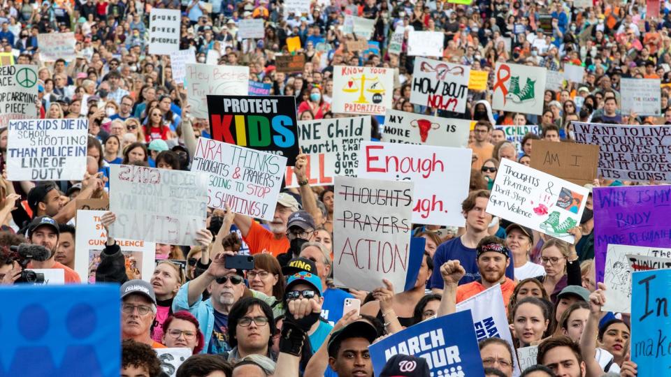 Crowds with signs gather at the March for our Lives rally against gun violence at the National Mall in Washington, D.C. on June 11, 2022.