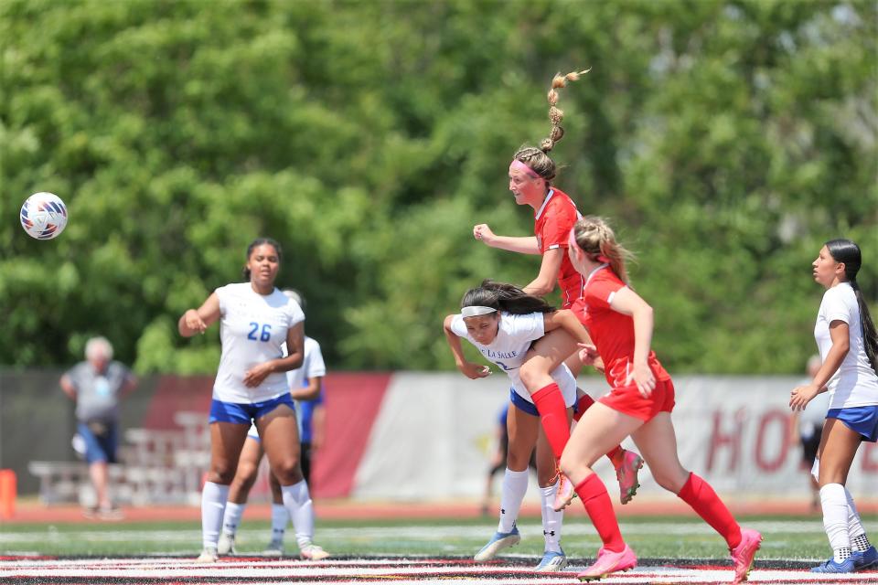 Chatham Glenwood's Haden Vlcek heads the ball for a goal against Chicago De La Salle during the first half of the Class 2A girls soccer state semifinal at Benedetti-Wehrli Stadium in Naperville on Friday, May 2, 2023.