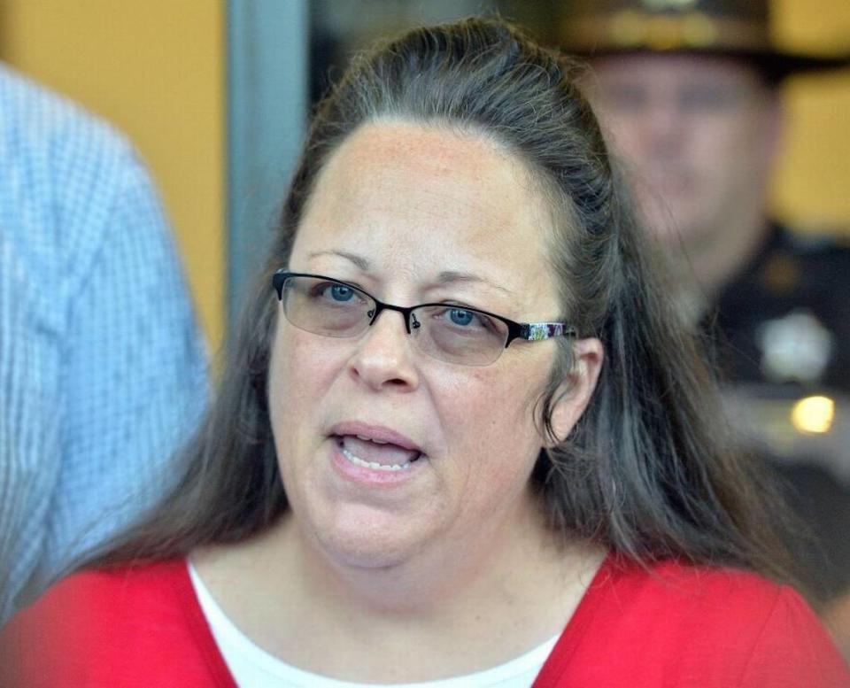 In this Sept. 14, 2015, file photo, Rowan County Clerk Kim Davis made a statement to the media at the front door of the Rowan County Judicial Center in Morehead. She announced that her office will issue marriage licenses under order of a federal judge, but the licenses will not have her name or office listed. Davis spent five days in jail for refusing to issue marriage licenses to same-sex couples.