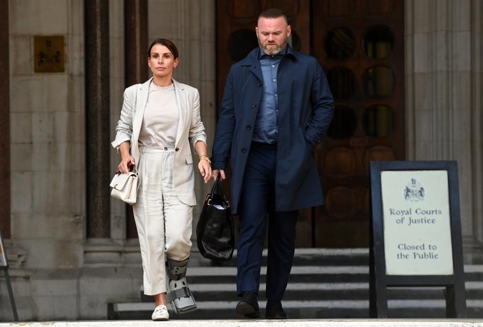 Wayne Rooney has been by his wife’s side throughout the trial (EPA)