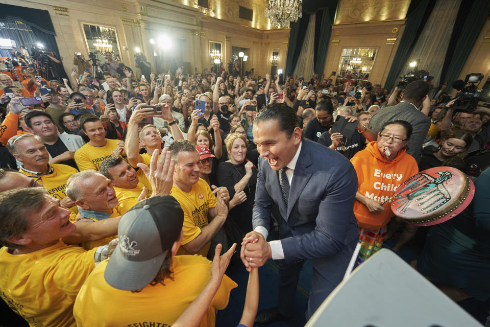 Manitoba NDP leader Wab Kinew greets supporters after winning the Manitoba Provincial election in Winnipeg, Manitoba, Tuesday, Oct. 3, 2023. The Canadian province of Manitoba has elected the first First Nations premier of a province in Canada.(David Lipnowski/The Canadian Press via AP)