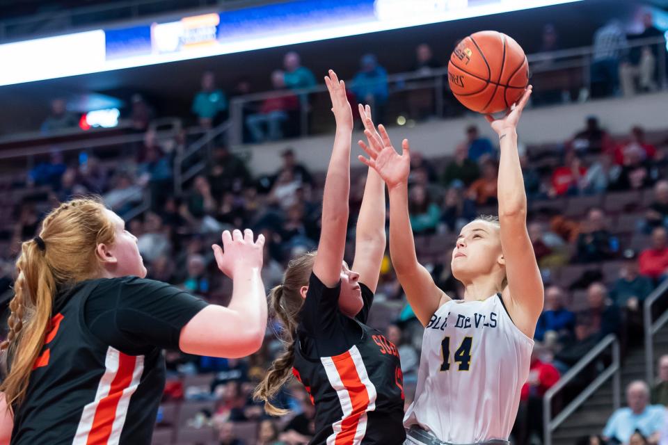 Greencastle-Antrim's Rylee Hinson (14) shoots the ball during the District 3 Class 5A girls' basketball championship against York Suburban at the Giant Center on March 2, 2023, in Derry Township. The Blue Devils won, 44-30.