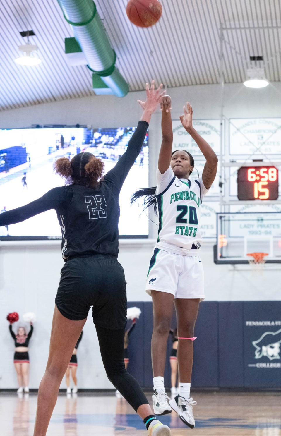 Ja'miyah Bryant (20) shoots during the Northwest Florida State College at Pensacola State College women's basketball game at Pensacola State College in Pensacola on Wednesday, Jan. 18, 2023.