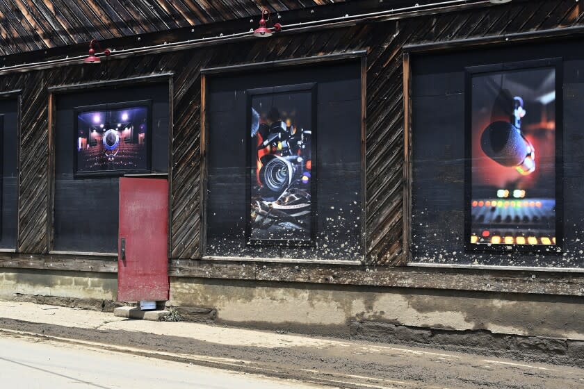 The flood water line is visible on the exterior wall of Appalshop in Whitesburg, Ky., Saturday, July 30, 2022. Appalshop is a media, arts, and education center created during the War on Poverty, in 1969. (AP Photo/Timothy D. Easley)