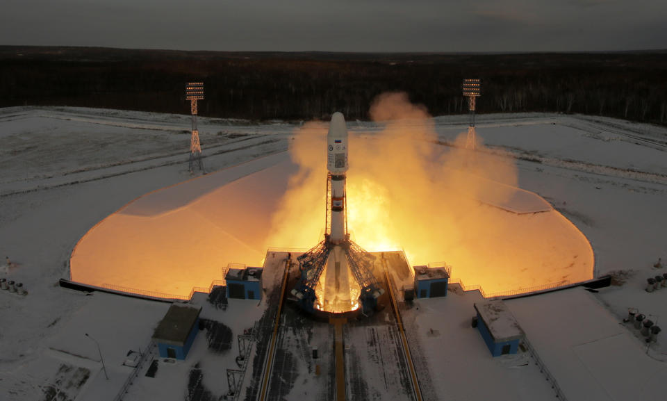 FILE - A Russian Soyuz 2.1b rocket carrying Meteor M satellite and additional 18 small satellites, lifts off from the launch pad at the new Vostochny cosmodrome outside the city of Tsiolkovsky, about 200 kilometers (125 miles) from the city of Blagoveshchensk in the far eastern Amur region, Russia, Tuesday, Nov. 28, 2017. Russia's Vostochny space launch facility where President Vladimir Putin hosted North Korean leader Kim Jong Un has a troubled history tarnished by construction delays and widespread corruption. (AP Photo/Dmitri Lovetsky, File)