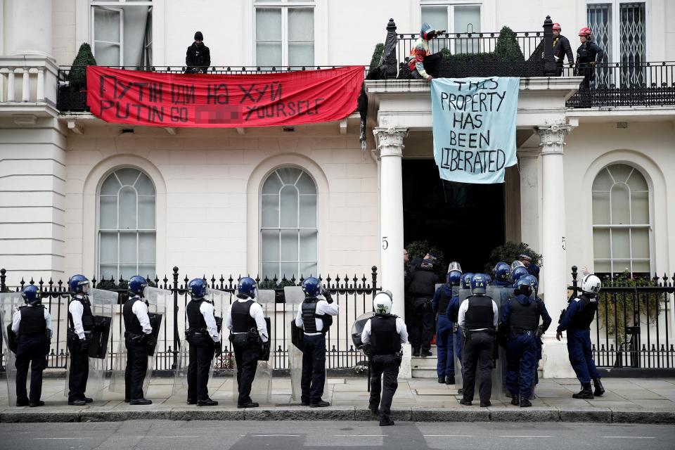 Riot police attempt to remove protesters from Deripaska’s house (Reuters)