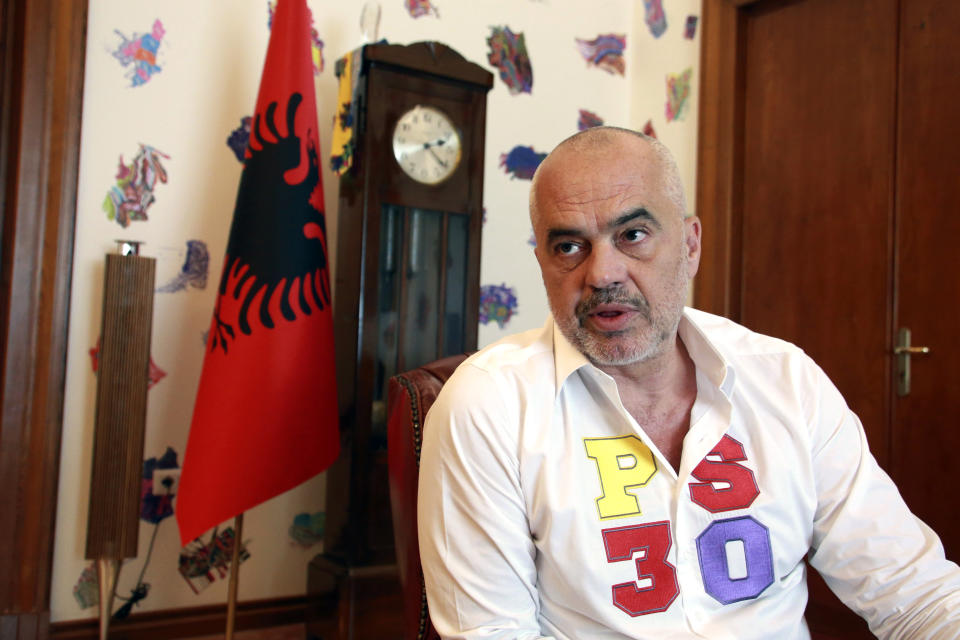 Albanian prime minister Edi Rama speaks during an interview to the Associated Press in Tirana, Friday, June 21, 2019. Rama says the opposition's main goal is to disrupt the country's efforts to launch full membership negotiations with the European Union. (AP Photo/Hektor Pustina)