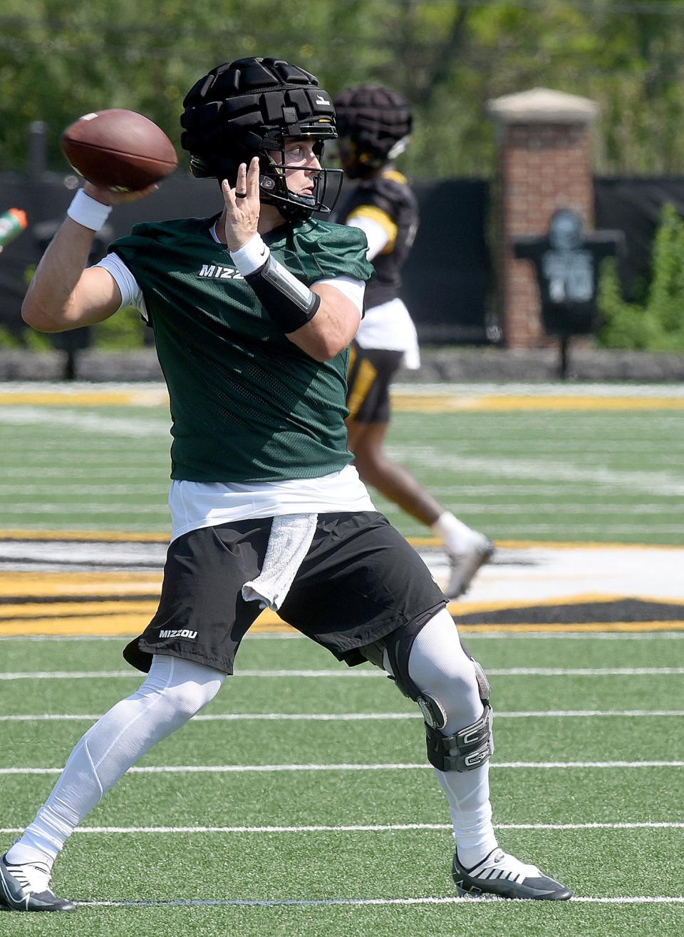 Missouri quarterback Jack Abraham prepares to throw a pass during the first practice of the 2022 season at the Kadlec Practice Fields