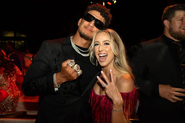 <p>Kansas City Chiefs</p> Patrick Mahomes poses with his three Super Bowl rings alongside wife Brittany Mahomes