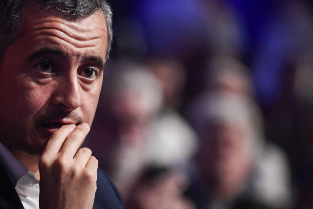 French Interior Minister Gerald Darmanin listens during the LREM congress and the launching of the party Renaissance in Paris, on September 17, 2022. (Photo by JULIEN DE ROSA / AFP)
