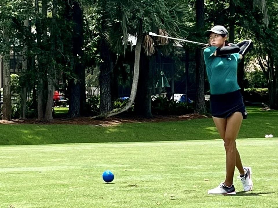 Wendy Hsiao, a Stetson senior, watches her tee shot at the 10th hole of the TPC Sawgrass Dye's Valley on Monday during the first round of the First Coast Women's Amateur.