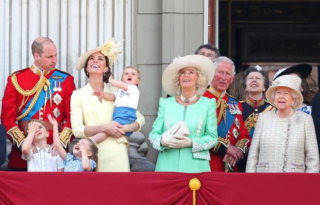 Royal family members at Trooping the Colour, the queen's annual birthday parade, on June 8, 2019, in London. Camilla, Duchess of Cornwall, in mint green, stands before Prince Charles. Prince William and Catherine, Duchess of Cambridge, stand at left with their children George, Charlotte and baby Louis.  (Photo: Chris Jackson via Getty Images)
