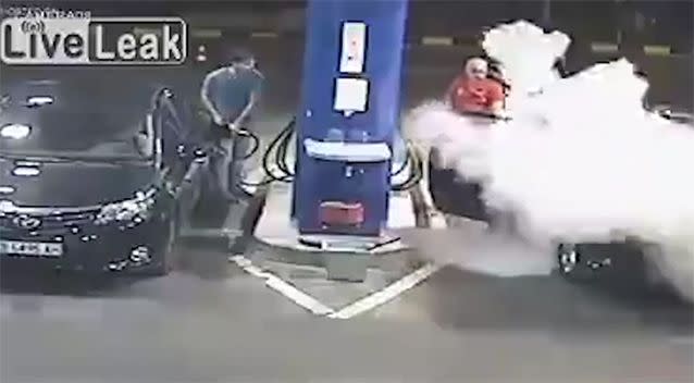 The man is sprayed by a fire extinguisher. Source: LiveLeak